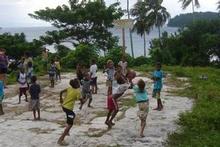 Children on the island of Pentecost play basketball court at the Latano Catholic Mission. Photo / Catherine Masters Children on the island of Pentecost play basketball court at the Latano Catholic Mission. Photo / Catherine Masters