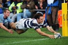 Auckland's Dave Thomas stretches out to score during his side's Air NZ Cup victory over Northland at Kerikeri. Photo / Getty Images Auckland's Dave Thomas stretches out to score during his side's Air NZ Cup victory over Northland at Kerikeri. Photo / Getty Images