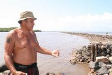 Mervyn Dudoit plans to give away the harvested fish to the community. Photo/ Jim Eagles Mervyn Dudoit plans to give away the harvested fish to the community. Photo/ Jim Eagles