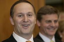 Prime Minister John Key's minority National Government has received a ringing endorsement from voters for its handling of the international financial crisis. Photo / Mark Mitchell Prime Minister John Key's minority National Government has received a ringing endorsement from voters for its handling of the international financial crisis. Photo / Mark Mitchell