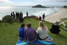 The Mount attracted its share of people keen to glimpse a tidal wave. Photo / Alan Gibson The Mount attracted its share of people keen to glimpse a tidal wave. Photo / Alan Gibson