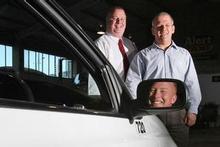 First Response manager Paul Staples (left) and Alert Group manager Rob Van Heiningen with Alert taxi driver Warren Gilchrist (in mirror). Photo / Dean Purcell First Response manager Paul Staples (left) and Alert Group manager Rob Van Heiningen with Alert taxi driver Warren Gilchrist (in mirror). Photo / Dean Purcell
