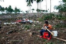 Houses close to the beach were flattened and other buildings shredded when the tsunami struck villages on the southeast coast of the island of Upolu. Photo / Brett Phibbs Houses close to the beach were flattened and other buildings shredded when the tsunami struck villages on the southeast coast of the island of Upolu. Photo / Brett Phibbs