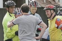 Witnesses offer information after Saturday's incident in St Heliers. Cycle Action Auckland has promised to take action. Photo / Herald on Sunday Witnesses offer information after Saturday's incident in St Heliers. Cycle Action Auckland has promised to take action. Photo / Herald on Sunday