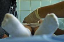 A Muslim boy is circumcised during a rite of passage in Kabul, Afghanistan. Photo / Getty Images A Muslim boy is circumcised during a rite of passage in Kabul, Afghanistan. Photo / Getty Images