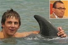 Sam Penny of Gisborne is towed by Moko the dolphin. Paul Henry (inset) said shooting Moko might stop the dolphin's boisterous antics. Photos / Alan Gibson and Janna Dixon Sam Penny of Gisborne is towed by Moko the dolphin. Paul Henry (inset) said shooting Moko might stop the dolphin's boisterous antics. Photos / Alan Gibson and Janna Dixon