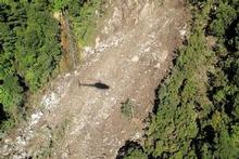 The 7.8-magnitude "rolling" quake cleared large areas of forest at Lake Purser, south of Dusky Sound. Photo / Simon Cox The 7.8-magnitude "rolling" quake cleared large areas of forest at Lake Purser, south of Dusky Sound. Photo / Simon Cox