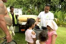 Oxfam water and sanitation engineer Dave Neru delivers clean water to displaced villagers. Photo / Jane Ussher / Oxfam Oxfam water and sanitation engineer Dave Neru delivers clean water to displaced villagers. Photo / Jane Ussher / Oxfam