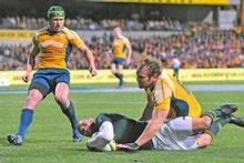 Wallabies Matt Giteau (L) and Rocky Elsom arrive too late to stop South Africa's Bryan Habana from scoring. Photo / Getty Images Wallabies Matt Giteau (L) and Rocky Elsom arrive too late to stop South Africa's Bryan Habana from scoring. Photo / Getty Images
