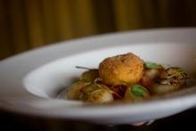 Tender: Scallop entree at Two Fifteen Bar and Bistro. Photo / Richard Robinson. Tender: Scallop entree at Two Fifteen Bar and Bistro. Photo / Richard Robinson.