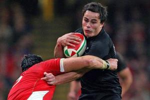 All Blacks wing Zac Guildford on attack during this morning's test against Wales in Cardiff. Photo / Getty Images