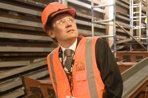 Transport Agency official Tommy Parker inside one of the harbour bridge clip-ons. Photo / Paul Estcourt