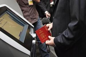 John Key tries out the SmartGate system. Photo / Sarah Ivey