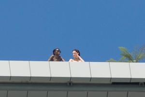 Two top model contestants enjoy the sun. Photo / Jason Dorday