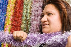 Marama Hetaraka with scarves to comfort abuse victims. Photo / Paul Estcourt