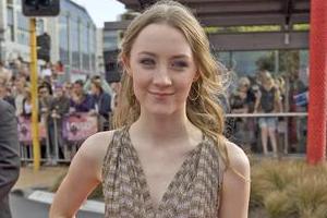 Saoirse Ronan, star of Peter Jackson's The Lovely Bones , poses on the red carpet in Wellington. Photo / Mark Mitchell