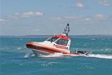 The exhausted family was rescued mid-morning by the Wanganui coastguard. Photo / Wanganui Chronicle The exhausted family was rescued mid-morning by the Wanganui coastguard. Photo / Wanganui Chronicle