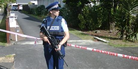 A police officer guards the scene where an officer was shot early hours this morning. Photo / Brett Phibbs A police officer guards the scene where an officer was shot early hours this morning. Photo / Brett Phibbs