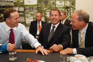 Prime Minister John Key chats with Super City mayoral contenders John Banks and Len Brown. Photo / Kenny Rodger