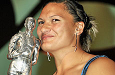 Valerie Vili celebrates with her Halberg Award trophy, one of her two victories at the Vector Arena last night. Photo / Martin Sykes Valerie Vili celebrates with her Halberg Award trophy, one of her two victories at the Vector Arena last night. Photo / Martin Sykes