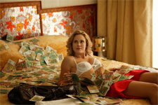 Anna Hutchison adjusting to the dress standards and pay rates of Aussie crime drama Underbelly's in which she plays Mr Asia associate Alison Dine. Photo / Supplied by Channel 9 Australia Anna Hutchison adjusting to the dress standards and pay rates of Aussie crime drama Underbelly's in which she plays Mr Asia associate Alison Dine. Photo / Supplied by Channel 9 Australia