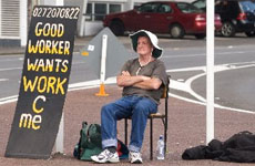 Unemployed Paul Snowden advertises for work at the Nelson St motorway on-ramp in Auckland. Photo / Paul Estcourt Unemployed Paul Snowden advertises for work at the Nelson St motorway on-ramp in Auckland. Photo / Paul Estcourt