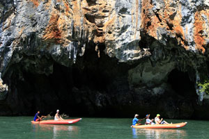 Inflatable kayaks tour through limestone caves on the island of Koh Panak in the Phang Nga Bay National Park north of Phuket. Photo / Martin Sykes