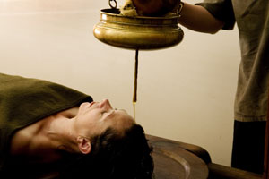 The Shirodhara technique on a patient at beauty salon Planet Ayurveda. Photo / Babiche Martens