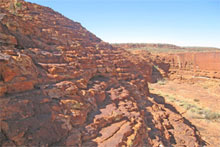 Kings Canyon is situated in the Watarrka National Park, some 450km southwest of Alice, with incredible sheer cliffs and domed rocks that look like piles of pancakes. Photo / Greg Dixon Kings Canyon is situated in the Watarrka National Park, some 450km southwest of Alice, with incredible sheer cliffs and domed rocks that look like piles of pancakes. Photo / Greg Dixon