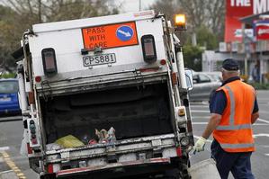Collection trucks are allowed warning lights to let people know they make frequent stops. Photo / Sarah Ivey
