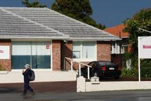 Unwelcome: This brothel which has been opened opposite Henderson Intermediate has upset parents and staff. Photo / Steven McNicholl Unwelcome: This brothel which has been opened opposite Henderson Intermediate has upset parents and staff. Photo / Steven McNicholl