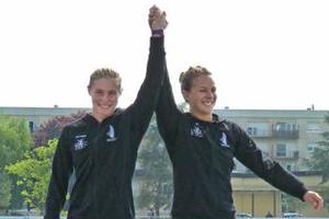 Teneale Hatton and Lisa Carrington celebrate their victory in the K2 women sprint. Photo / Supplied