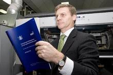 Finance Minister Bill English viewing a copy of the 2010 Budget. Photo / Mark Mitchell Finance Minister Bill English viewing a copy of the 2010 Budget. Photo / Mark Mitchell