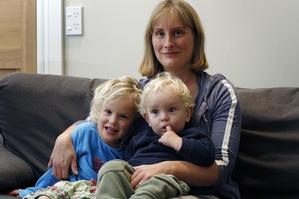 Carol Curtis makes about $220 a week and pays $100 for daycare for her youngest children, Matilda and Henry. Photo / Sarah Ivey