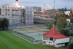 Auckland Grammar is worried about the impact of the new building (rear) on its sports facilities. Photo / Steven McNicholl