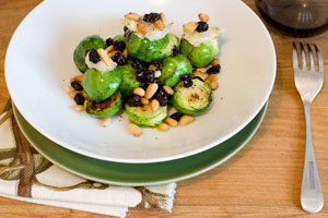 Brussels sprouts with roasted garlic and pinenuts. Photo / Greg Bowker