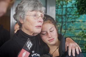 Hawea Vercoe's mother Rosalind comforts his daughter Moerangi. Photo / Christine Cornege