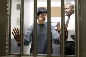 A prison officer shows Herald journalist Derek Cheng his cell in the new container block, Unit 1, at Rimutaka Prison. Photo / Mark Mitchell