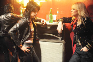 The Runaways is about the band of the same name which launched the career of Joan Jett (played by Kristen Stewart, far left). Photo / Supplied