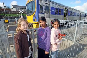 Avondale Primary School pupils (from left) Brook Whiu, 9, Shivaanee Ram, 10, and Khushmita Ram, 11, check out the station. Photo / Dean Purcell