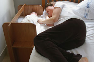 Helensville Birthing Centre has recently introduced clip-on 'sidecar' cots for newborns. Photo / Supplied