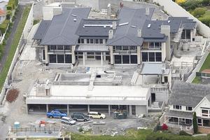 Construction work has resumed on the Hanover Finance co-founder's Paritai Drive house, but once it's finished it will be sold. Photo / Richard Robinson