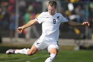 All Whites striker Shane Smeltz in action against Chile. Photo / Brett Phibbs