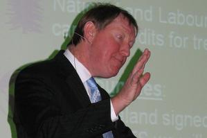 Nick Smith endeavours to placate a lively audience over government's ETS in Blenheim last night. Photo / Tony Orman