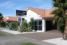 The single-level White Heron Motor Lodge is set on a large 3036sq m site with excellent profile to busy Gladstone Rd and good accessibility. Photo / Supplied The single-level White Heron Motor Lodge is set on a large 3036sq m site with excellent profile to busy Gladstone Rd and good accessibility. Photo / Supplied