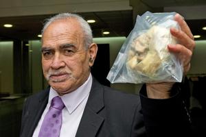 Mohi Waihi, of Upper Hutt, with his old heart after giving evidence at the Maori Affairs select committee inquiry. Photo / Mark Mitchell