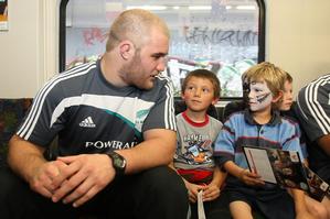 Ben Franks was one of 10 All Blacks on the train with Marist under-7's players yesterday. Photo / Greg Bowker