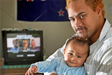 Daniel Brown, with 5-month-old Eruwera, checks out the new DVD about how to be a father. Photo / Natalie Slade Daniel Brown, with 5-month-old Eruwera, checks out the new DVD about how to be a father. Photo / Natalie Slade