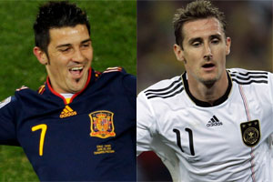 Spanish striker David Villa will be up against Germany's Miroslav Klose. Photos / AP
