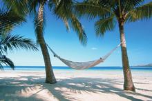 This Fijian beach scene is many people's idea of the perfect holiday. Photo / Supplied This Fijian beach scene is many people's idea of the perfect holiday. Photo / Supplied